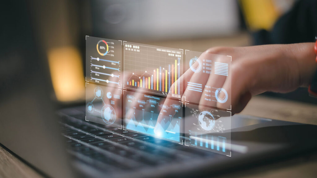 user analyzing data on laptop
